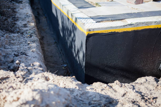 Professional Basement Waterproofing technician working in Saginaw, MI